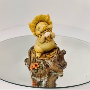 Pigsville 1992 Piglet Figurine Eating Ice Cream Wearing a Bonnet Sitting On Log